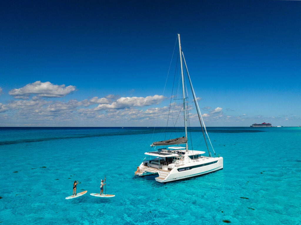 Leopard 52 at anchor, paddleboards